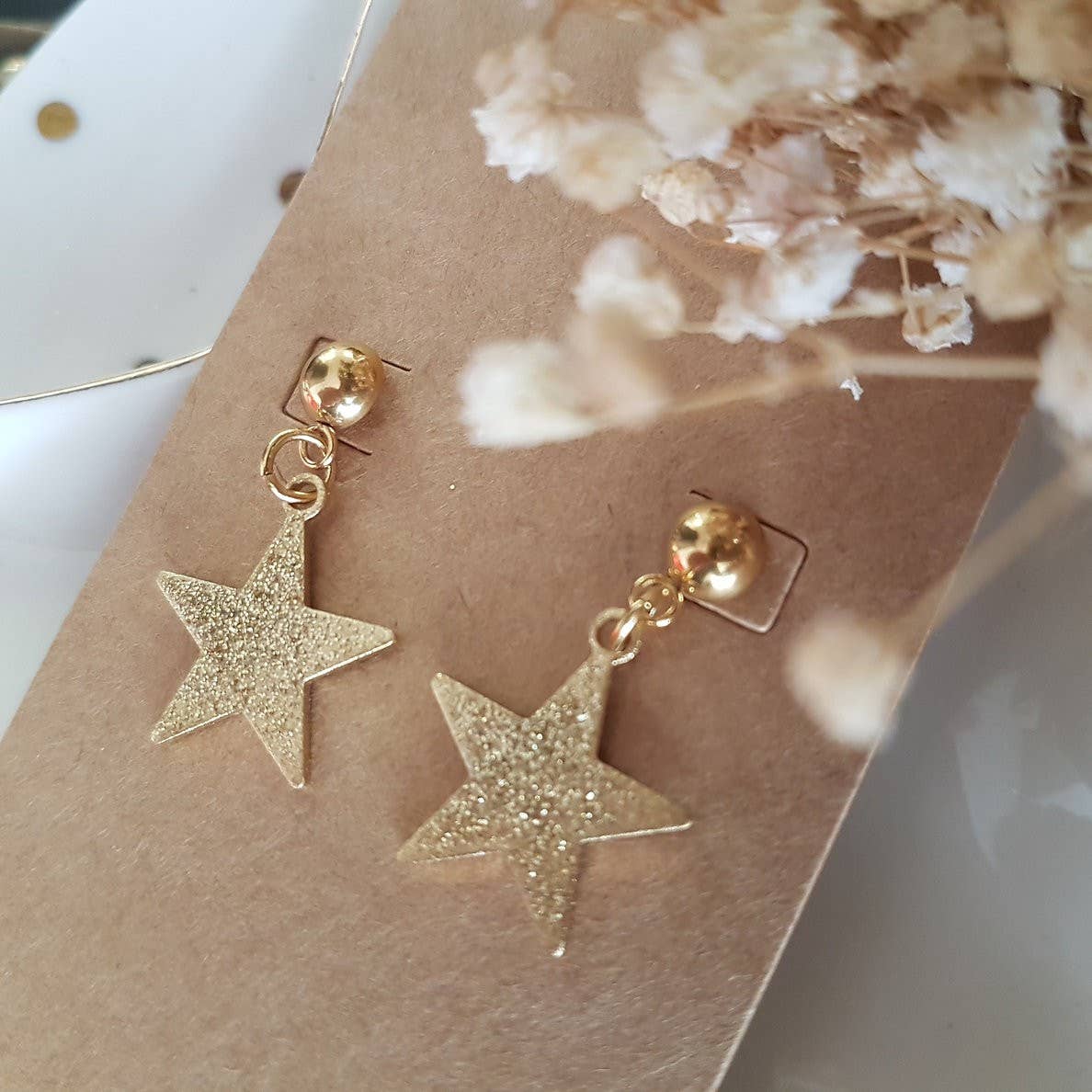 Boucles pendantes Étoiles laiton et acier inoxydable